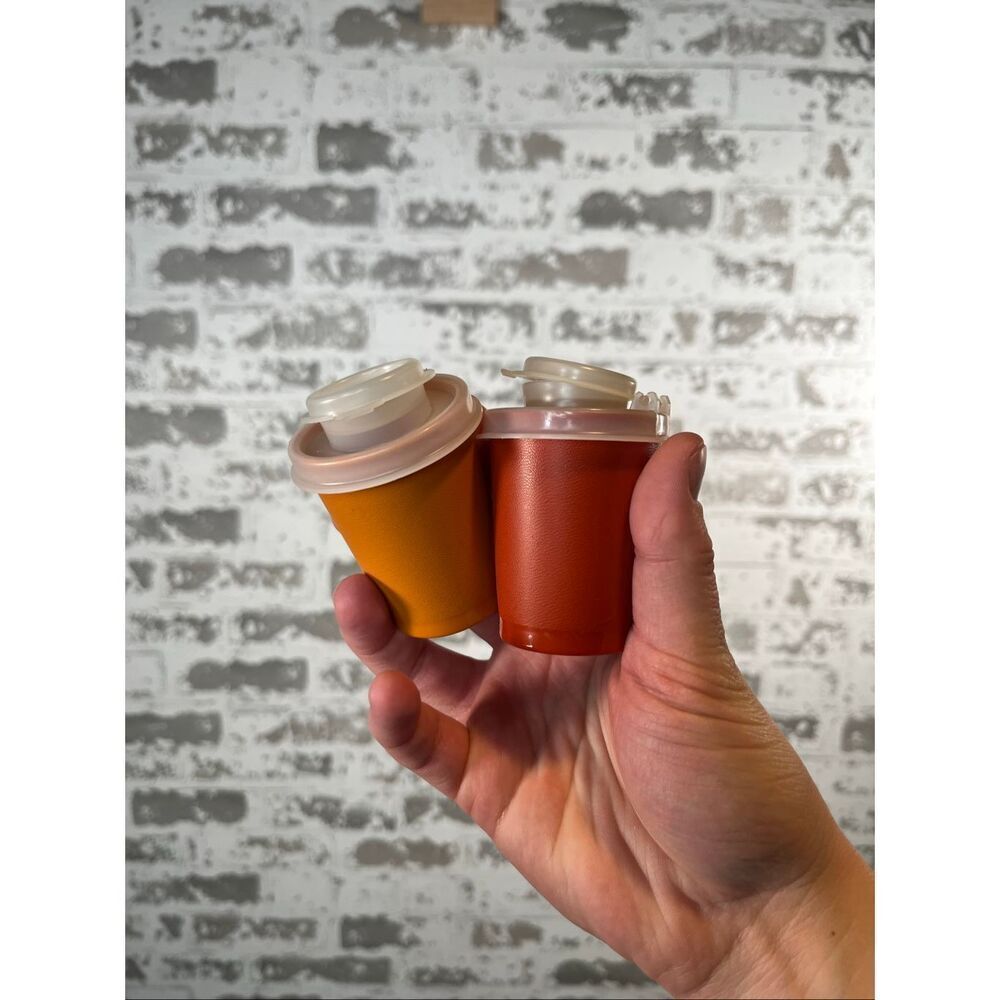 Tupperware | vintage spice salt and pepper shakers orange and red